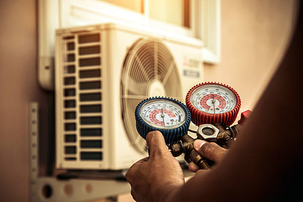 Professional Heat Pump Repair technician working in Fountain Run, KY